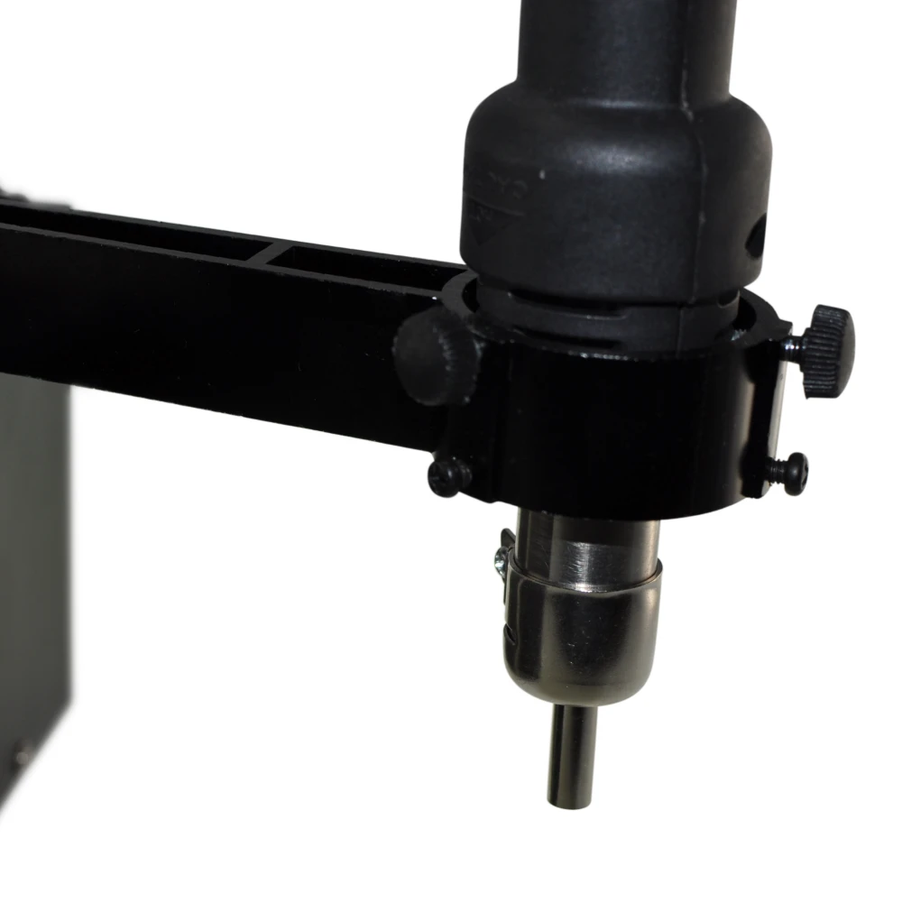 Vista lateral del soporte para pistola de calor Mlink en taller de reparación